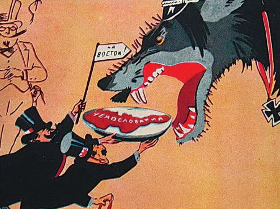 Чемберлен и Даладье скармливают Чехословакию Германии, надеясь направить её на Восток; американский деляга одобрительно наблюдает за процессом. Карикатура художников Кукрыниксы на Мюнхенский сговор