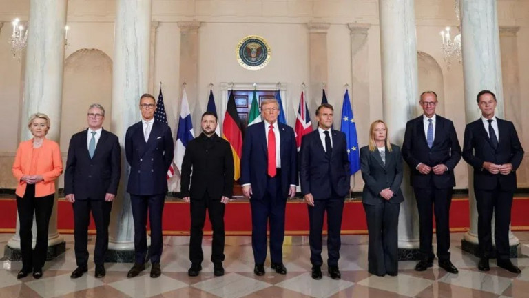 Заглавное фото : Участники переговоров в Белом доме 18.08.2025: президент США, шестёрка политиков из Европы, генсек НАТО и какой-то служащий похоронного бюро