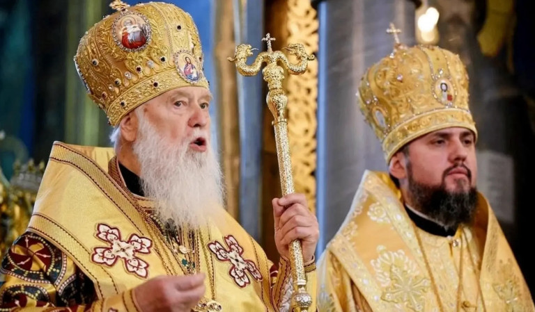 На заглавном фото: Раскольники "Филармон", предавший Церковь и "Епифан", предавший "Филармона" и ныне пожирающий его детище – "Киевский патриархат"